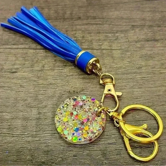 Gold Tone Keychain with Hand Crafted Sparkles Amulet and Blue Tassel - Picture 1 of 2